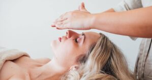 Woman Receiving A Buccal Facial Massage Treatment